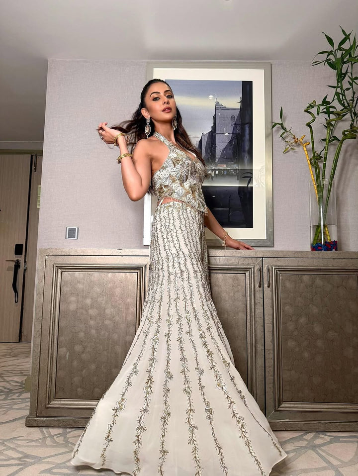 Ivory georgette high waist sharara paired with a corset blouse