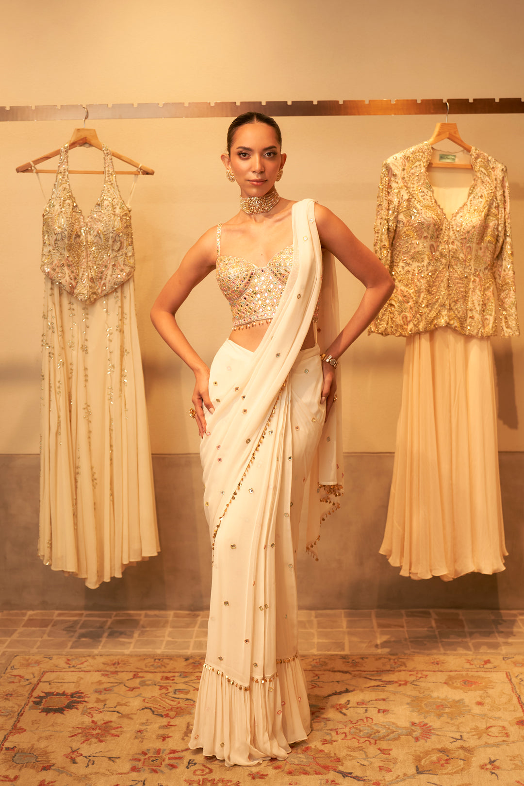 Ivory Pre Draped Saree With Embroidered Corset Blouse