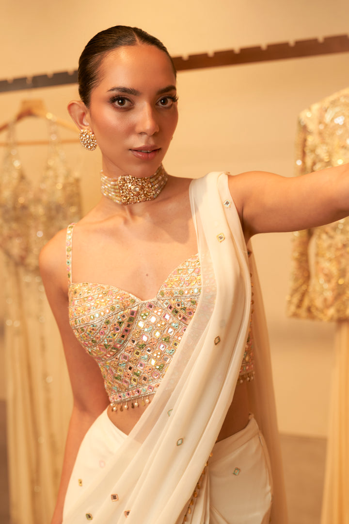 Ivory Pre Draped Saree With Embroidered Corset Blouse