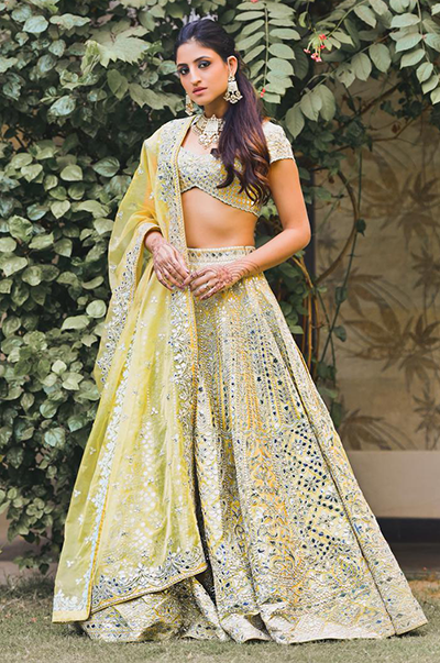 Karishma Yadav In Yellow Chanderi Lehenga With Blue Resham And Foil