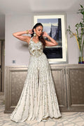 Rakulpreet in ivory georgette high waist sharara paired with a corset blouse