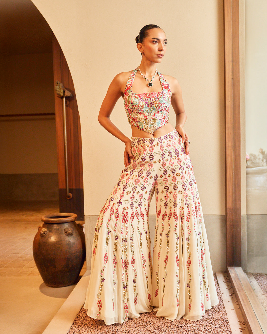IVORY HIGH WAIST SHARARA PAIRED WITH A CORSET TOP