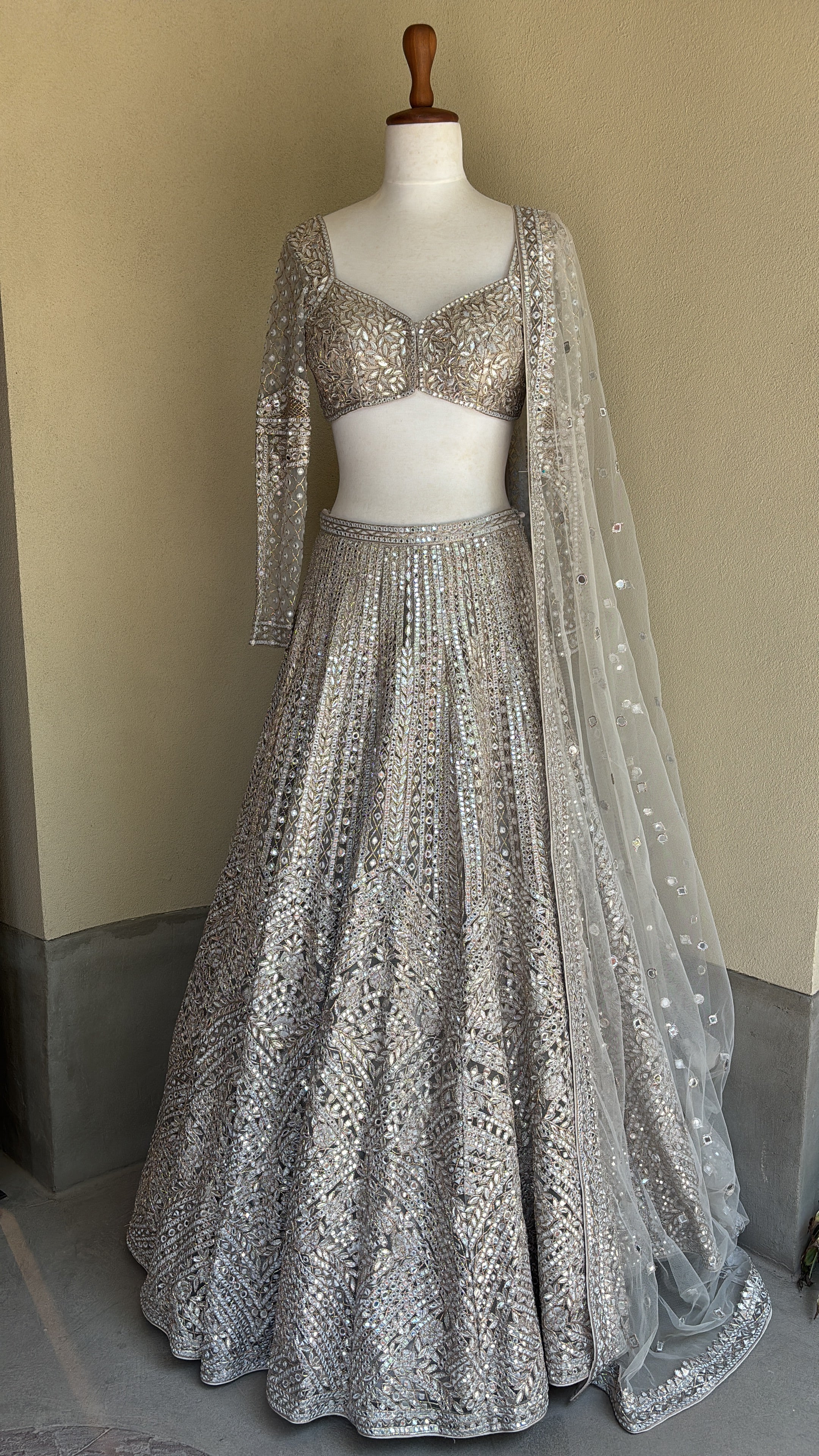 Grey lehenga set with foil, thread and dori work