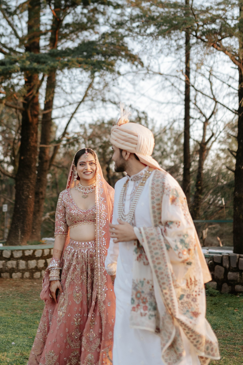 ANUSHA RAJ IN OUR SUFIYAANA SUNKISSED CORAL ORGANZA LEHENGA FOR HER WEDDING