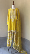 Yellow chanderi kurta paired with embroidered salwar and organza dupatta