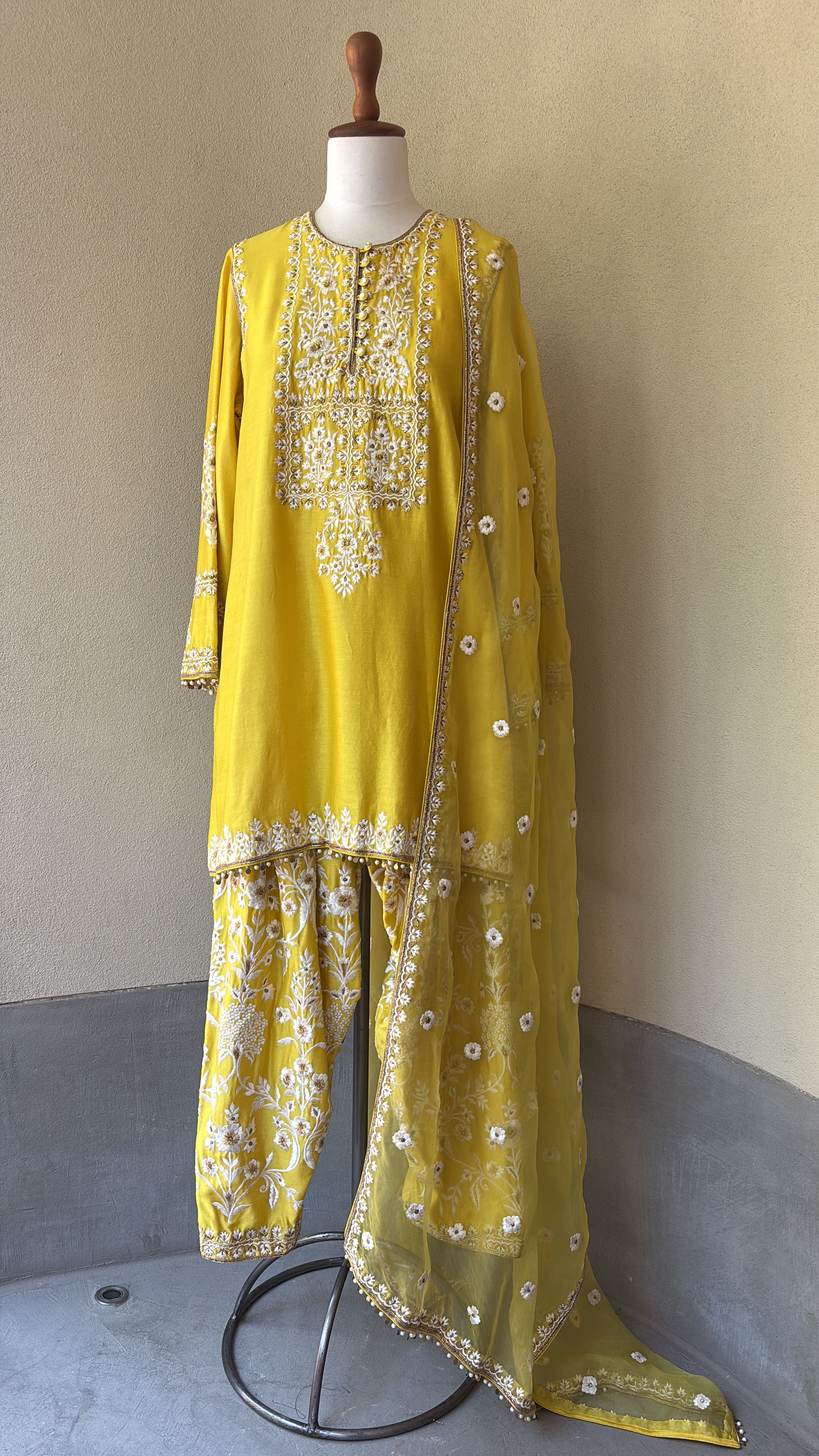 Yellow chanderi kurta paired with embroidered salwar and organza dupatta