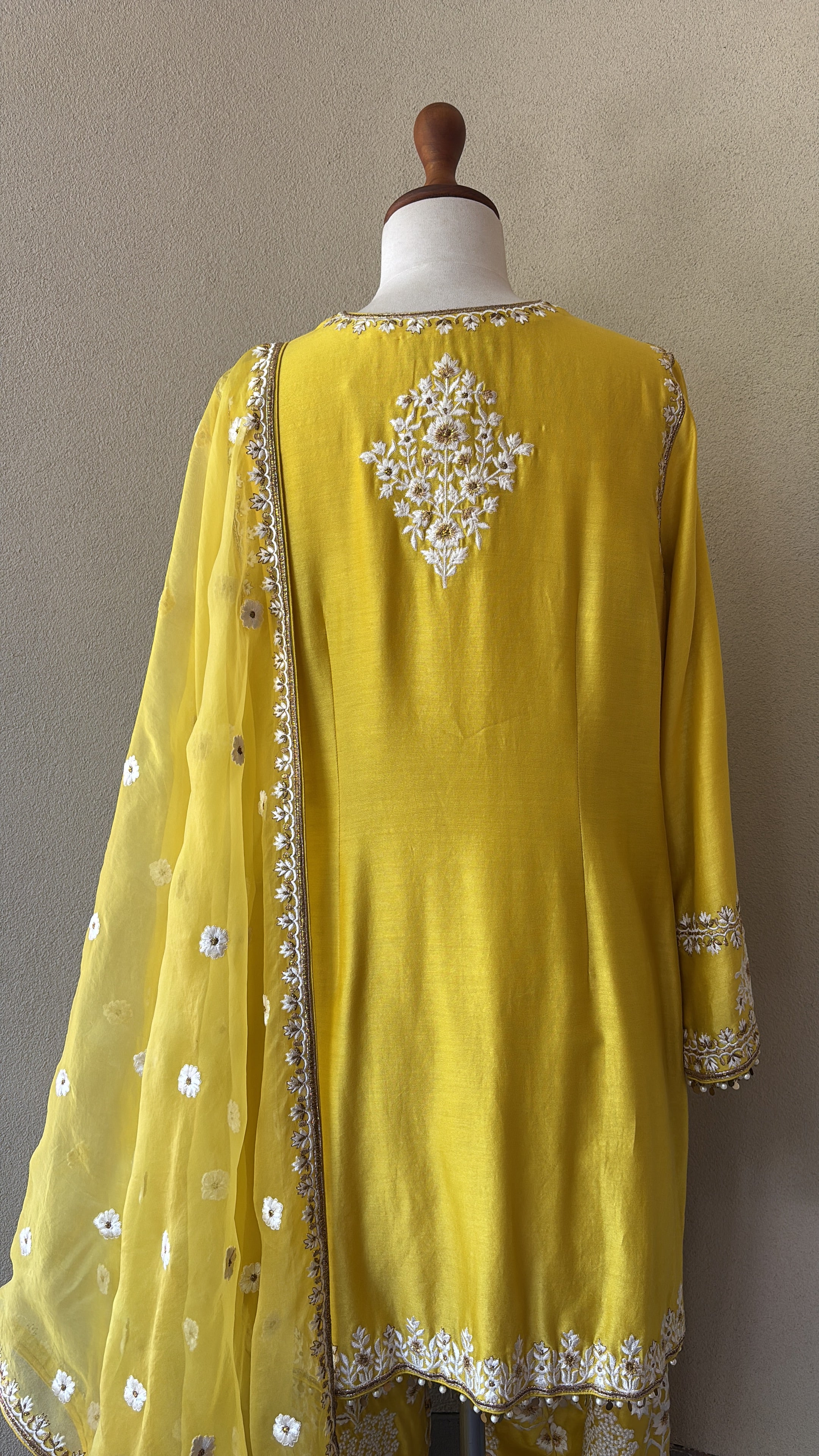 Yellow chanderi kurta paired with embroidered salwar and organza dupatta