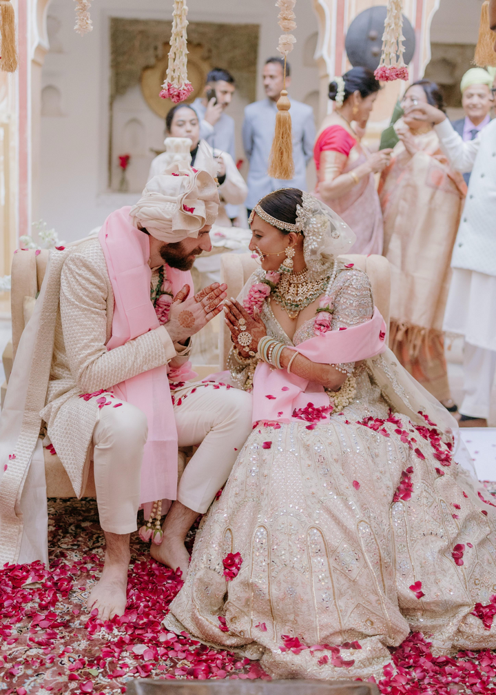 SHARANYA  IN OUR SERENADE IVORY MULTI COLOURED EMBROIDERED LEHENGA SET