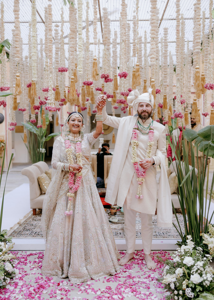 SHARANYA  IN OUR SERENADE IVORY MULTI COLOURED EMBROIDERED LEHENGA SET