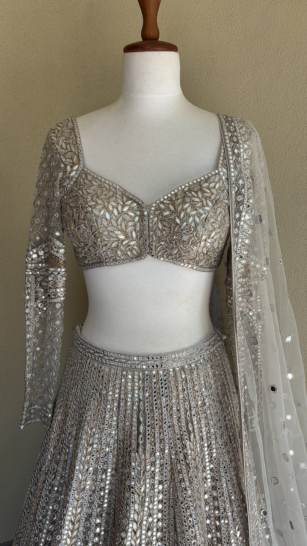 Grey lehenga set with foil, thread and dori work