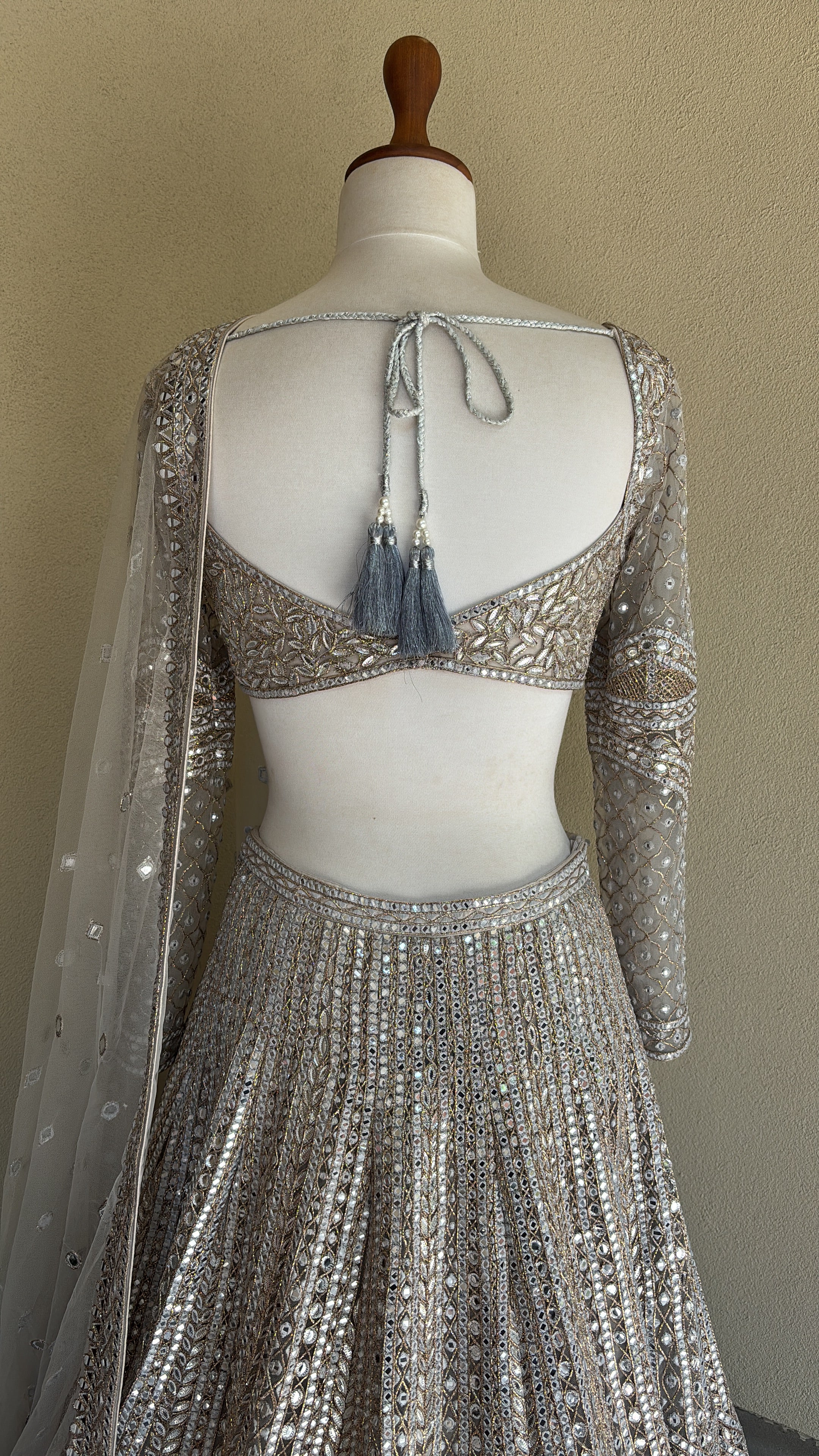 Grey lehenga set with foil, thread and dori work