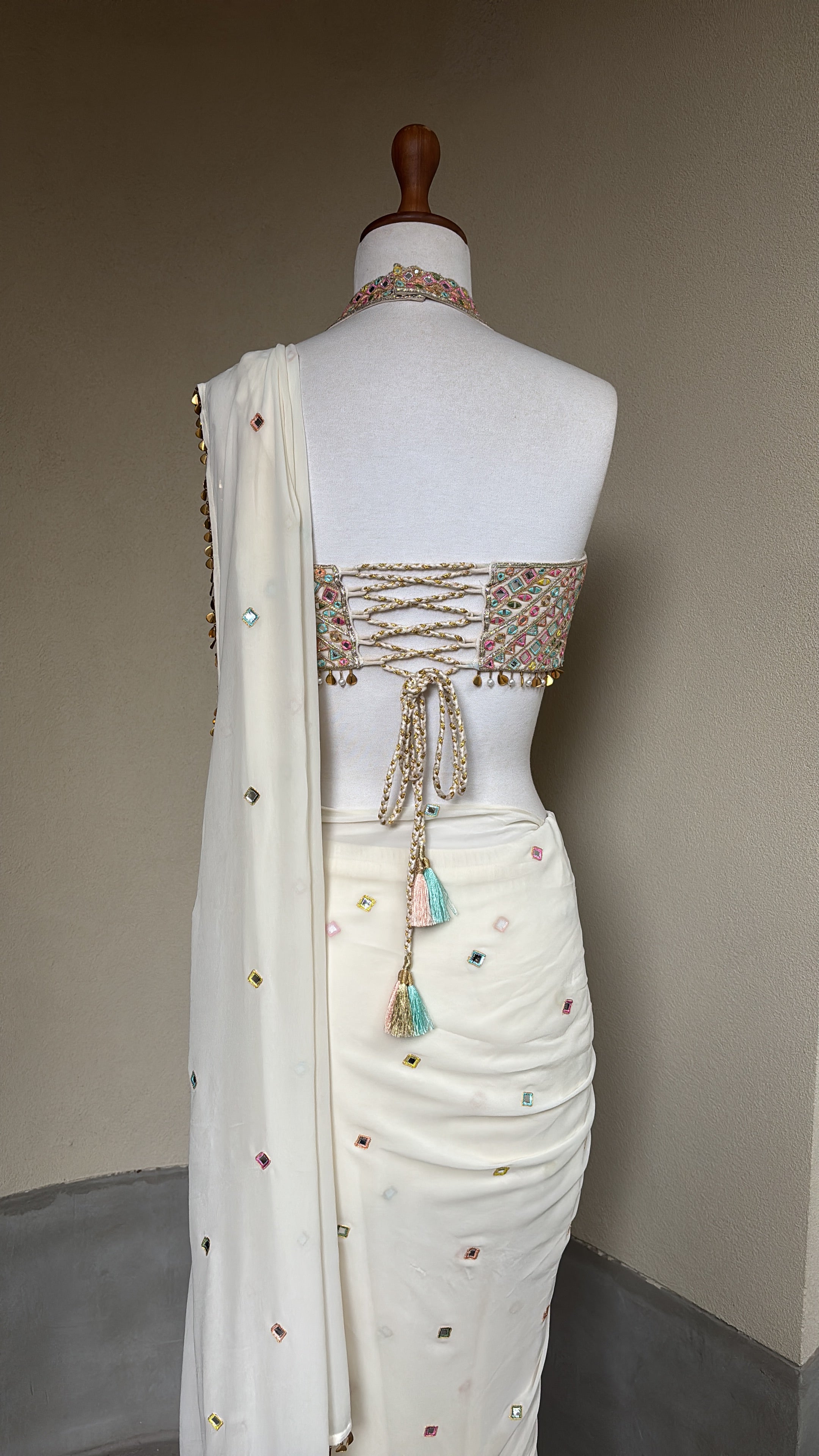 Pre-Drape Ivory Saree With Embroidered Corset Blouse