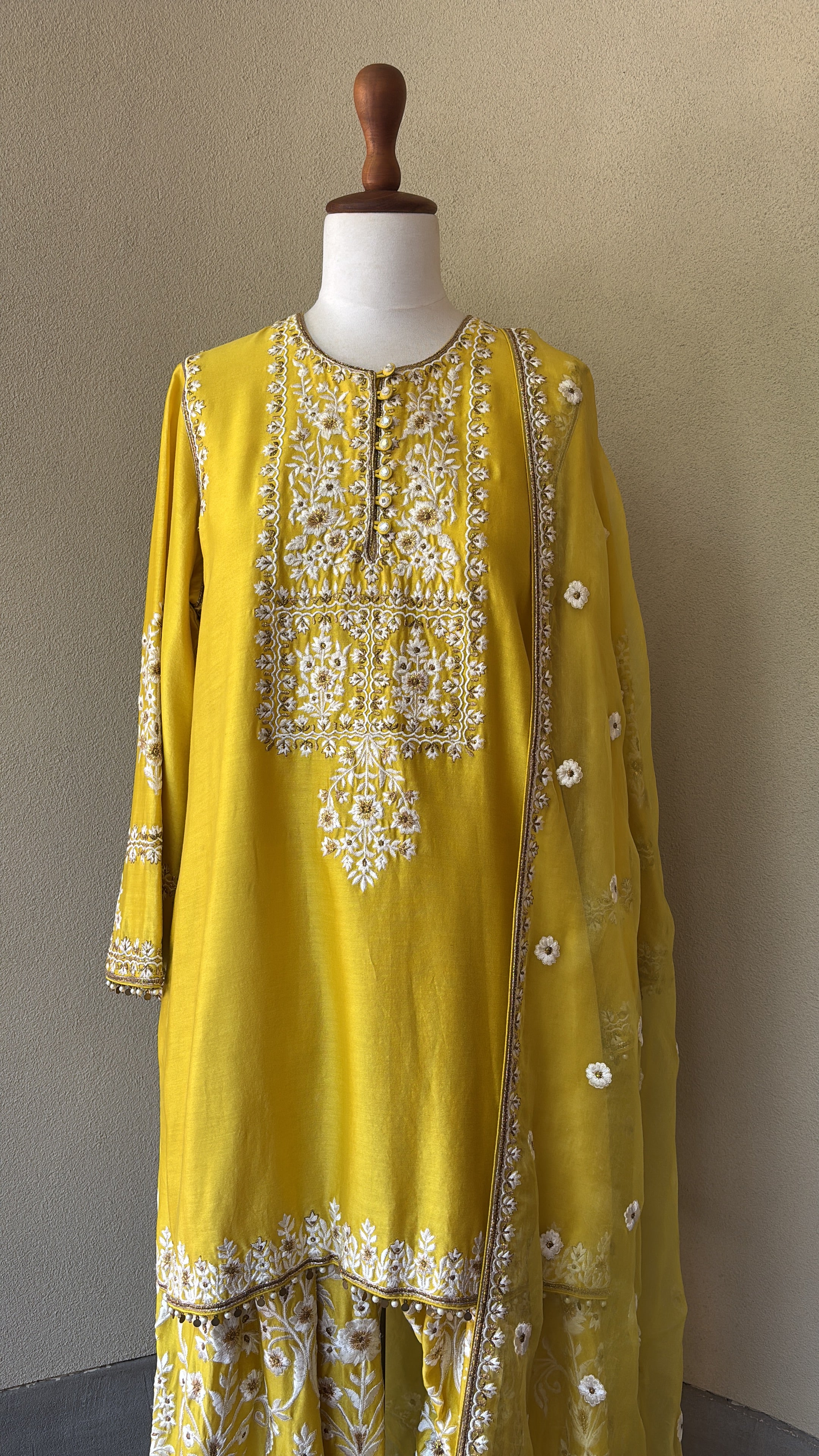 Yellow chanderi kurta paired with embroidered salwar and organza dupatta