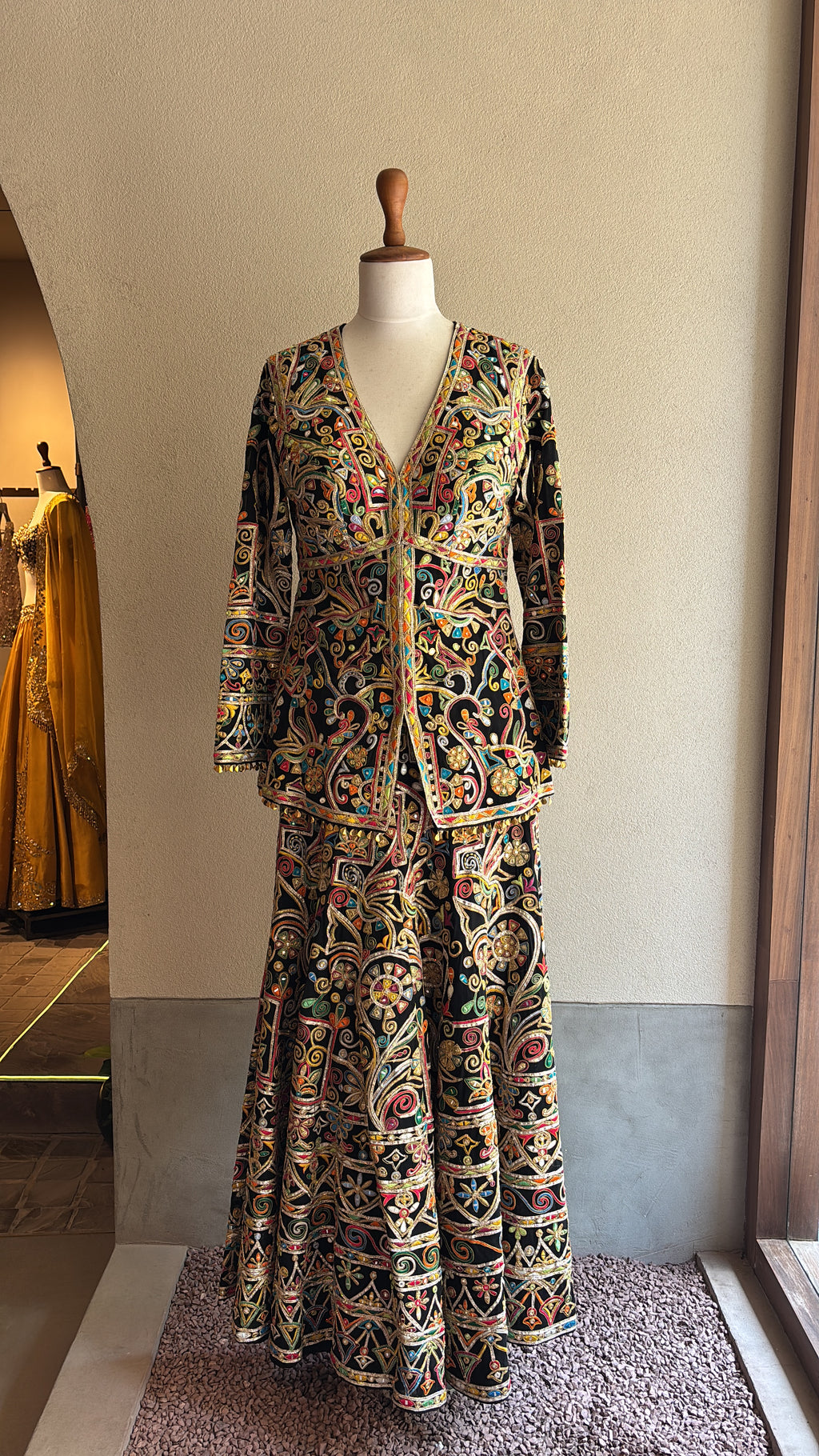 Black Sharara With A Peplum Kurta