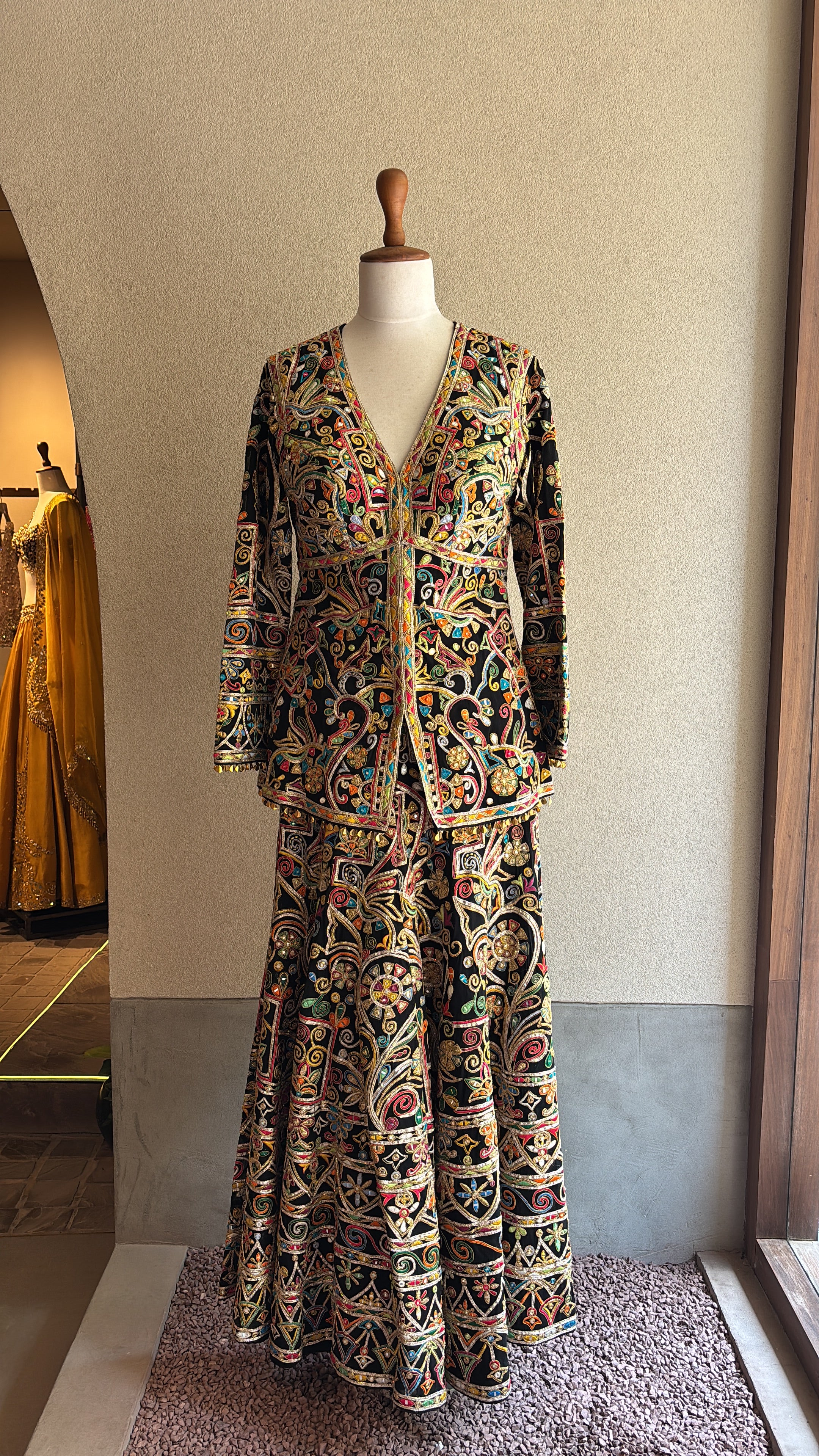 Black Sharara With A Peplum Kurta