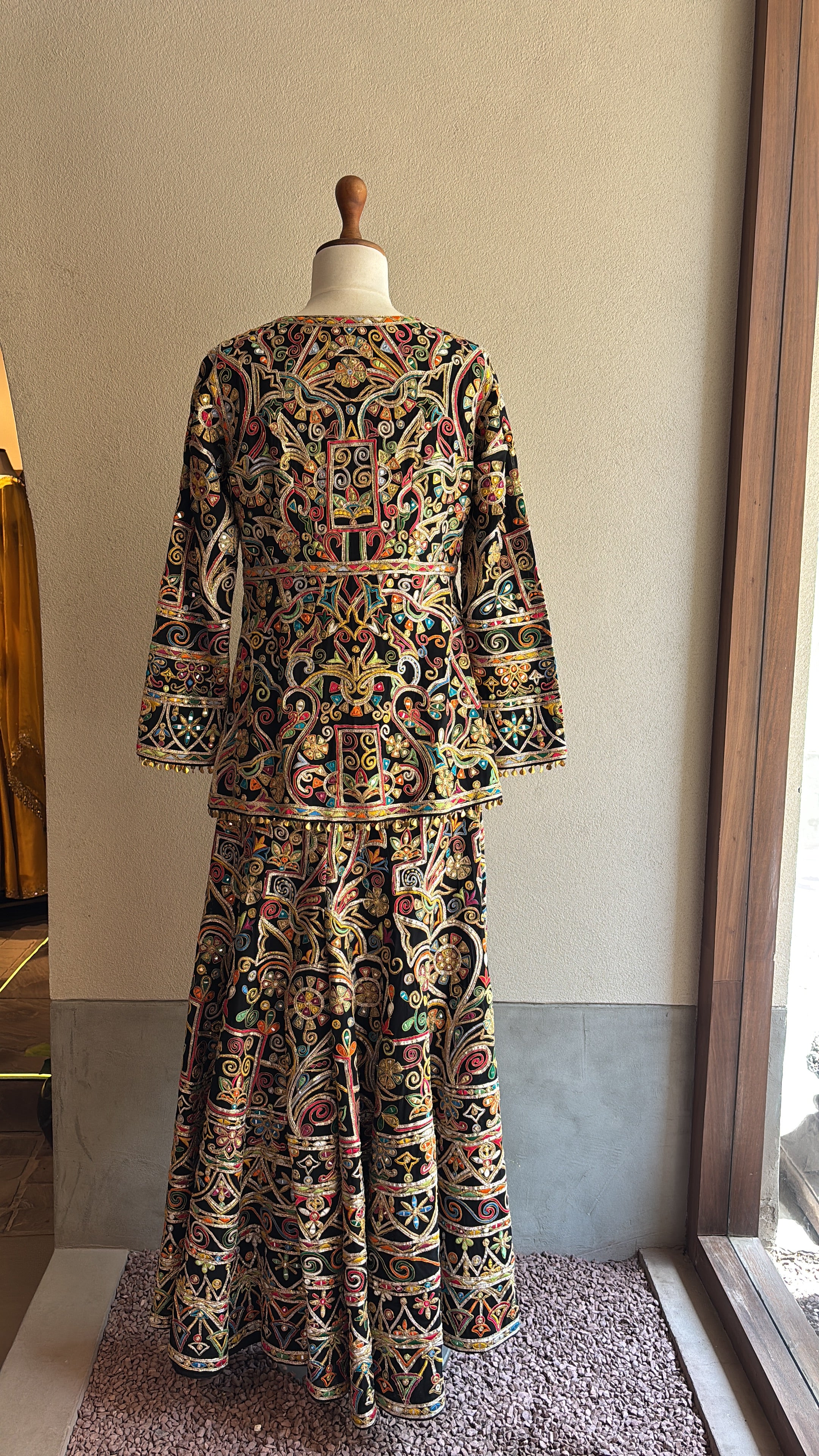 Black Sharara With A Peplum Kurta