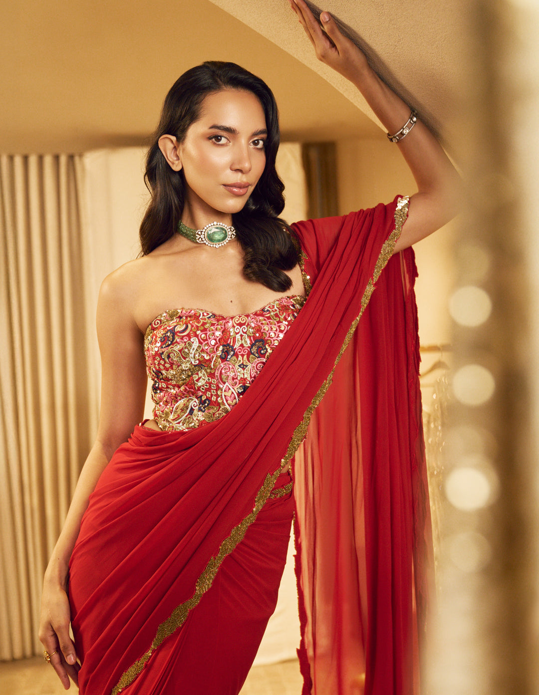 RED PRE DRAPED SAREE SET WITH A CORSET BLOUSE