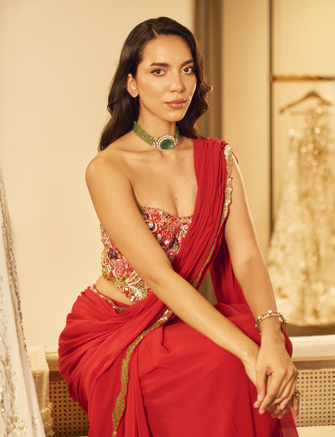 RED PRE DRAPED SAREE SET WITH A CORSET BLOUSE