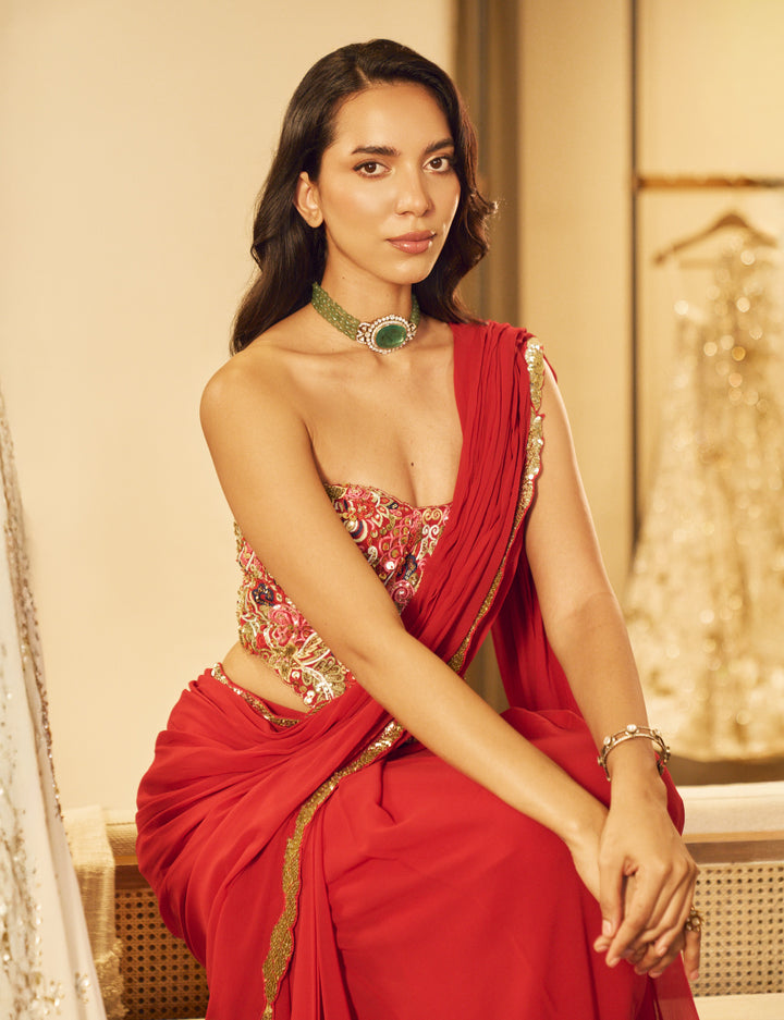 RED PRE DRAPED SAREE SET WITH A CORSET BLOUSE