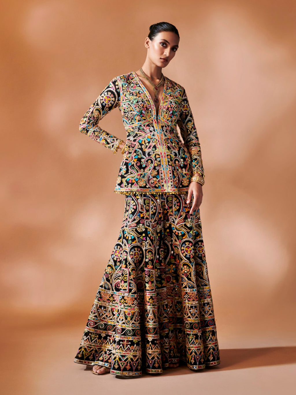 Black Sharara With A Peplum Kurta