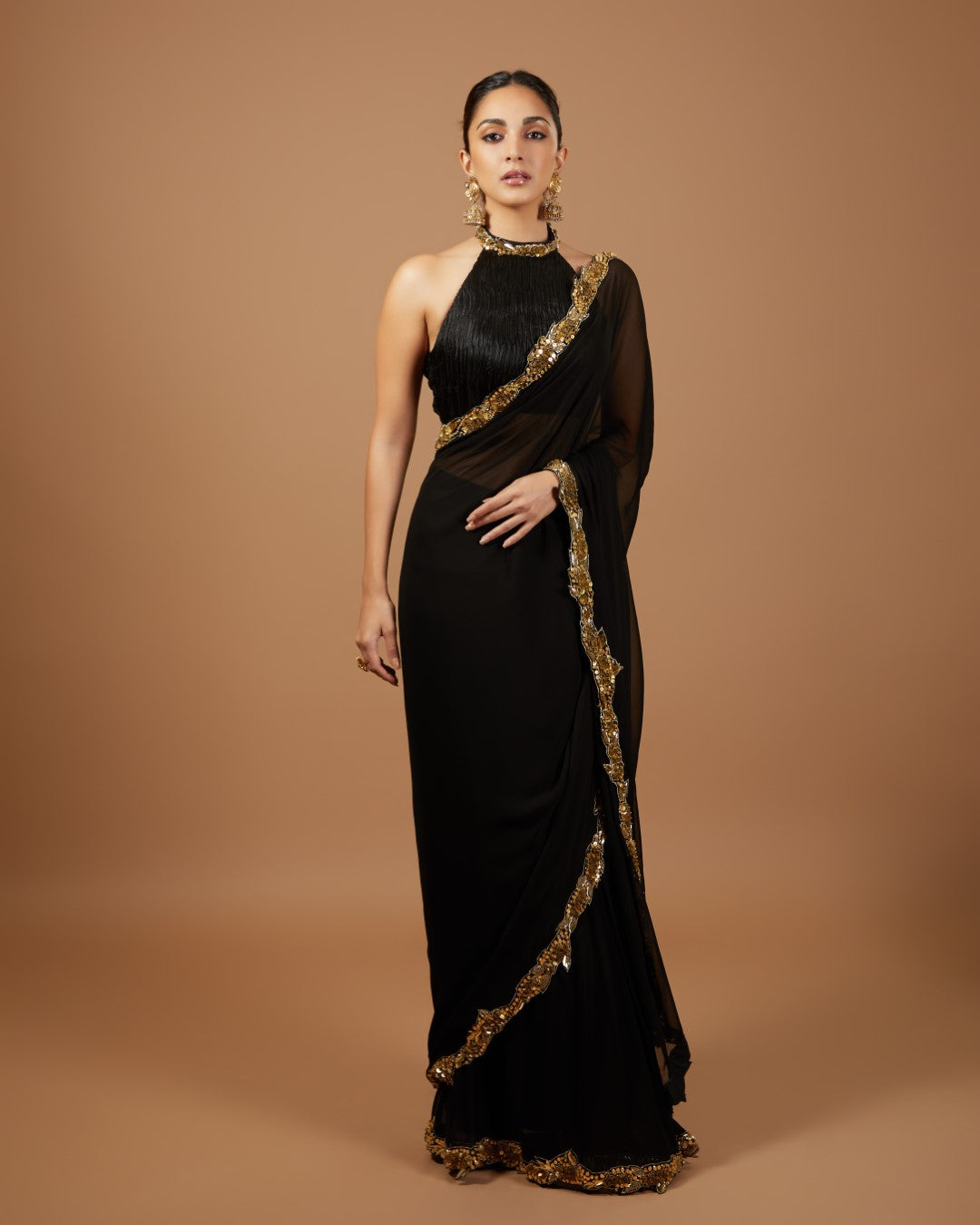 Kiara Advani in Black And Gold Saree Set