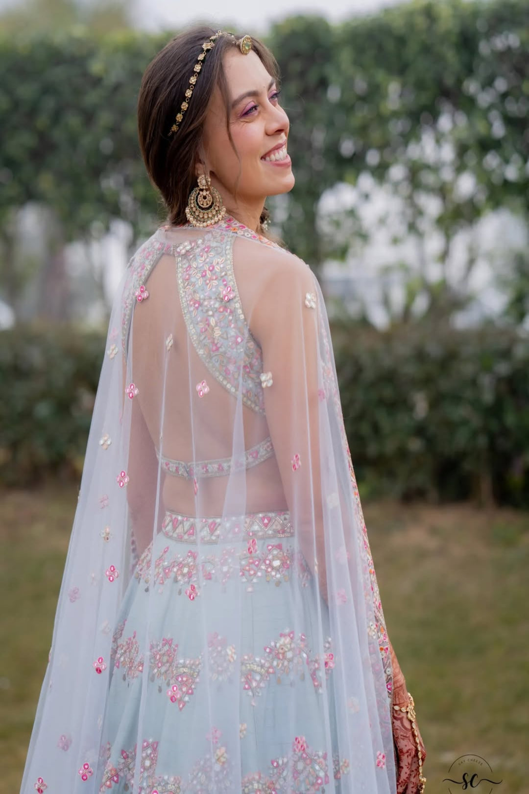 SARAH FELLAY IN OUR SERENADE ENGLISH BLUE MIRROR LEHENGA