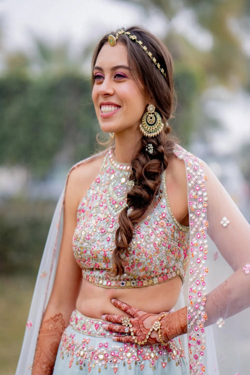 SARAH FELLAY IN OUR SERENADE ENGLISH BLUE MIRROR LEHENGA