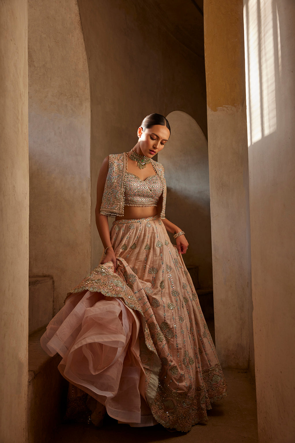 Peach Lehenga With Short Jacket And Bustier