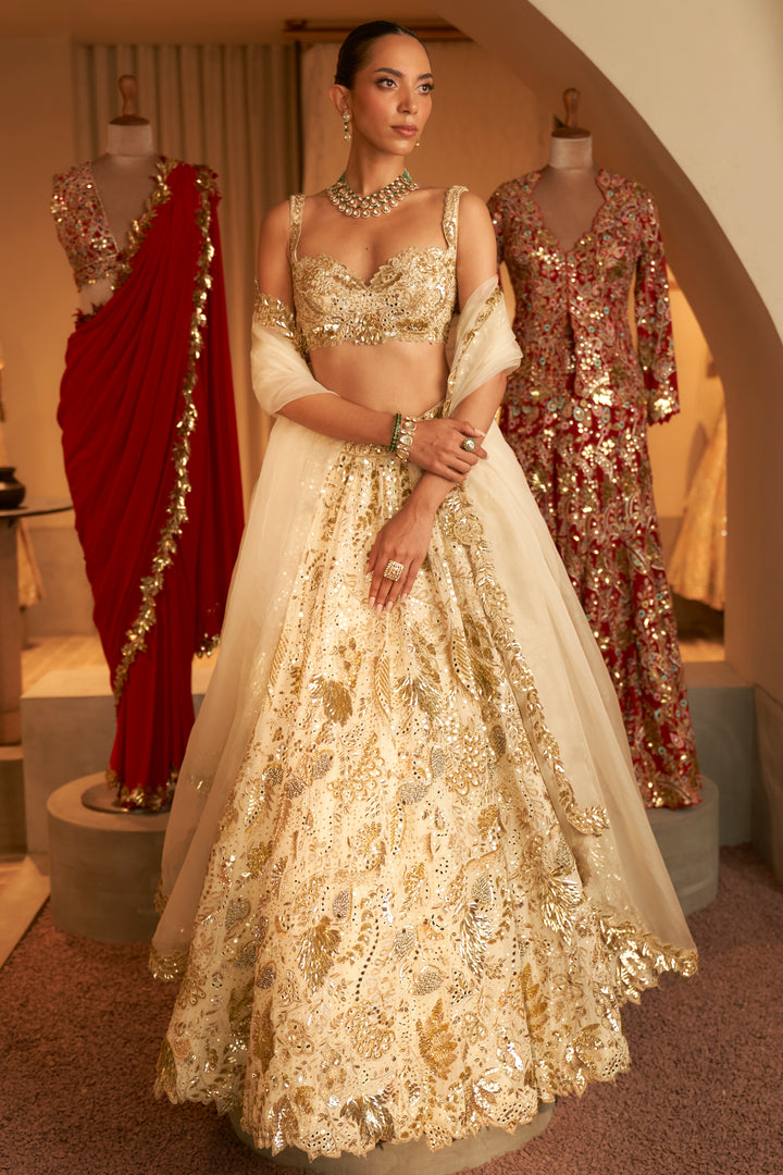 IVORY AND GOLD HEAVILY EMBROIDERED LEHENGA SET