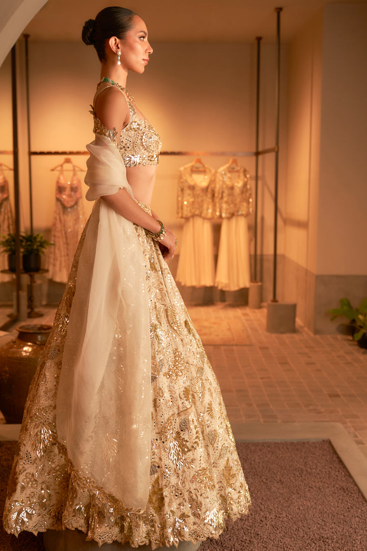 IVORY AND GOLD HEAVILY EMBROIDERED LEHENGA SET