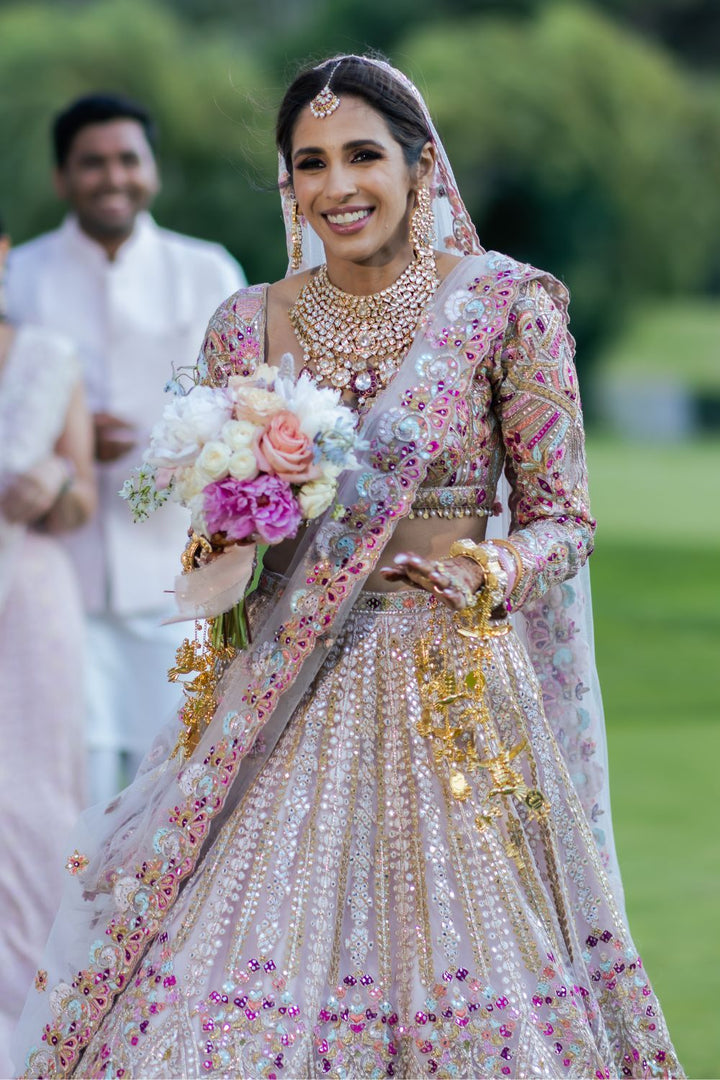 Gunjan Amarnani In Pink Tulle Self and Multicoloured Embroidered Lehenga Set