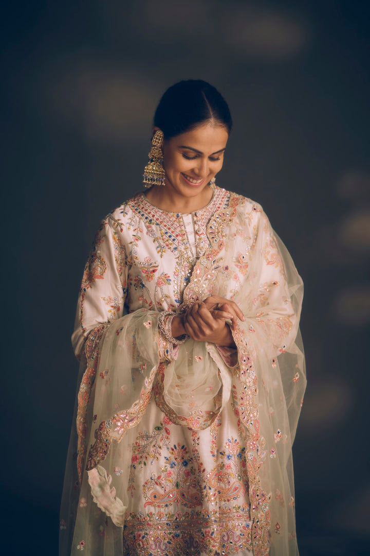 GENELIA IN IVORY CHANDERI KALI KURTA PAIRED WITH A DHOTI