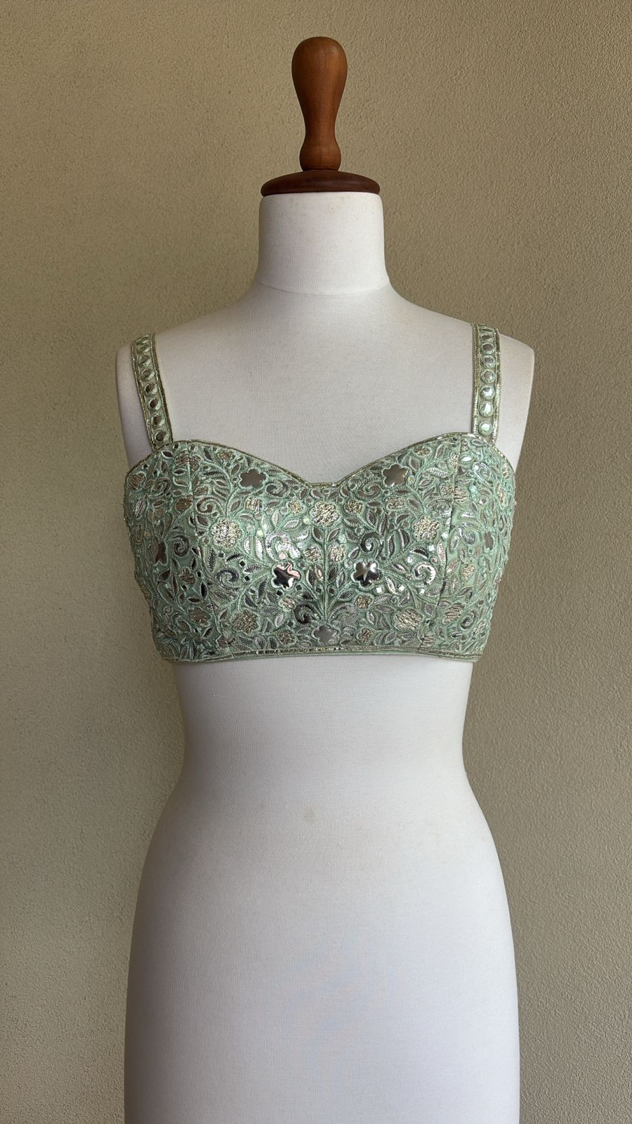 Sea green blouse with foil embroidery