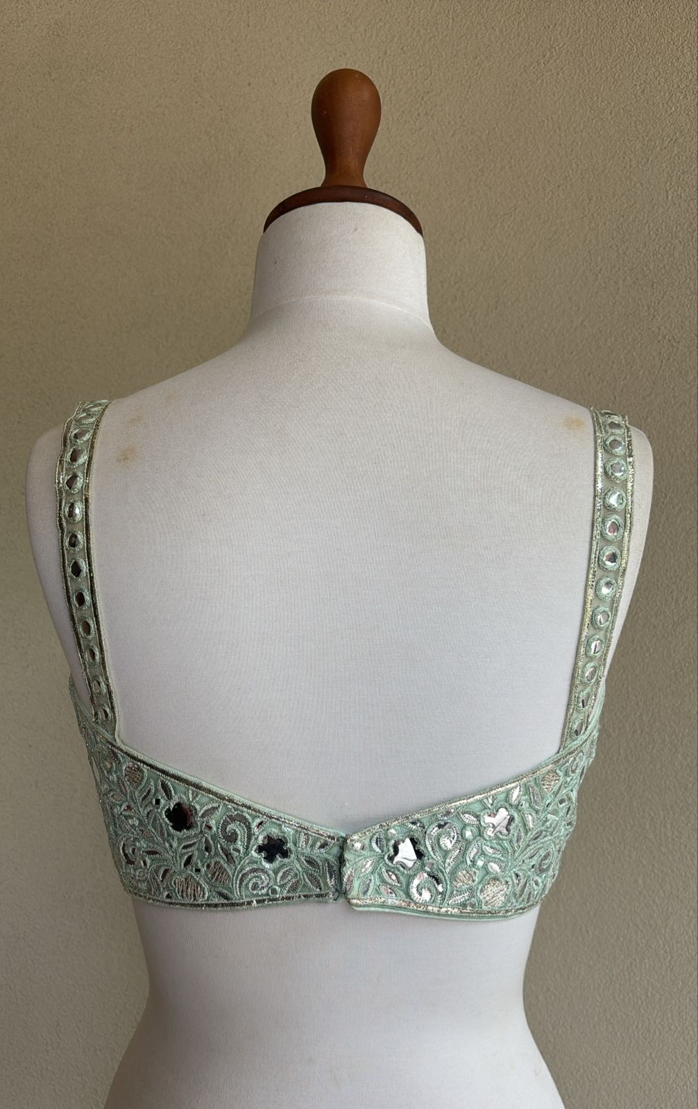 Sea green blouse with foil embroidery