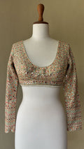 Green georgette blouse with multi colored foil embroidery