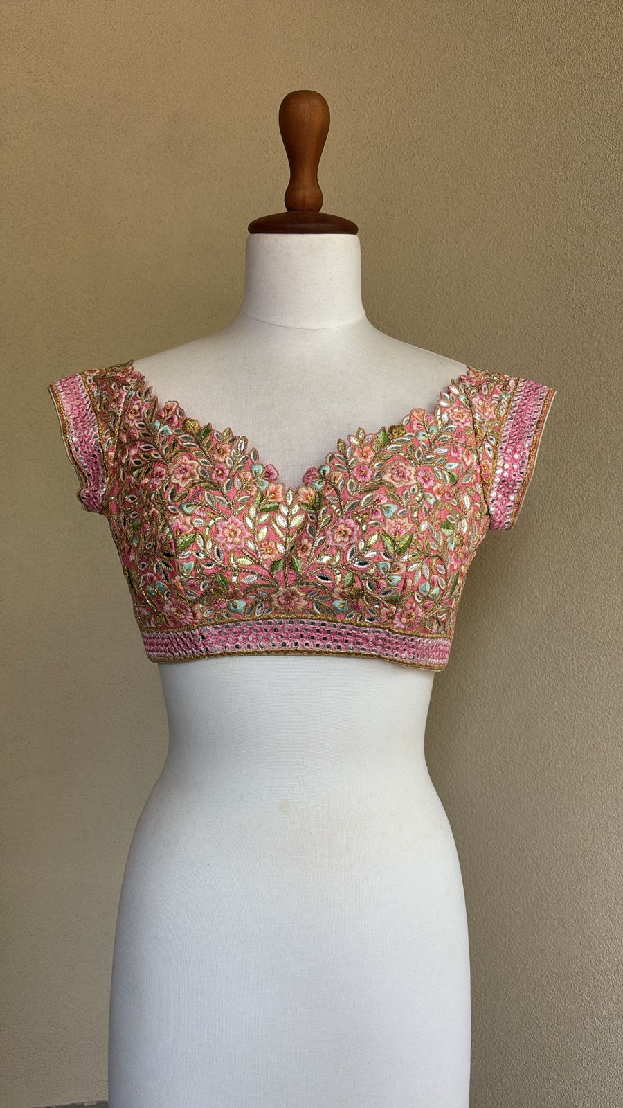 Pink off shoulder blouse with multi resham and foil work