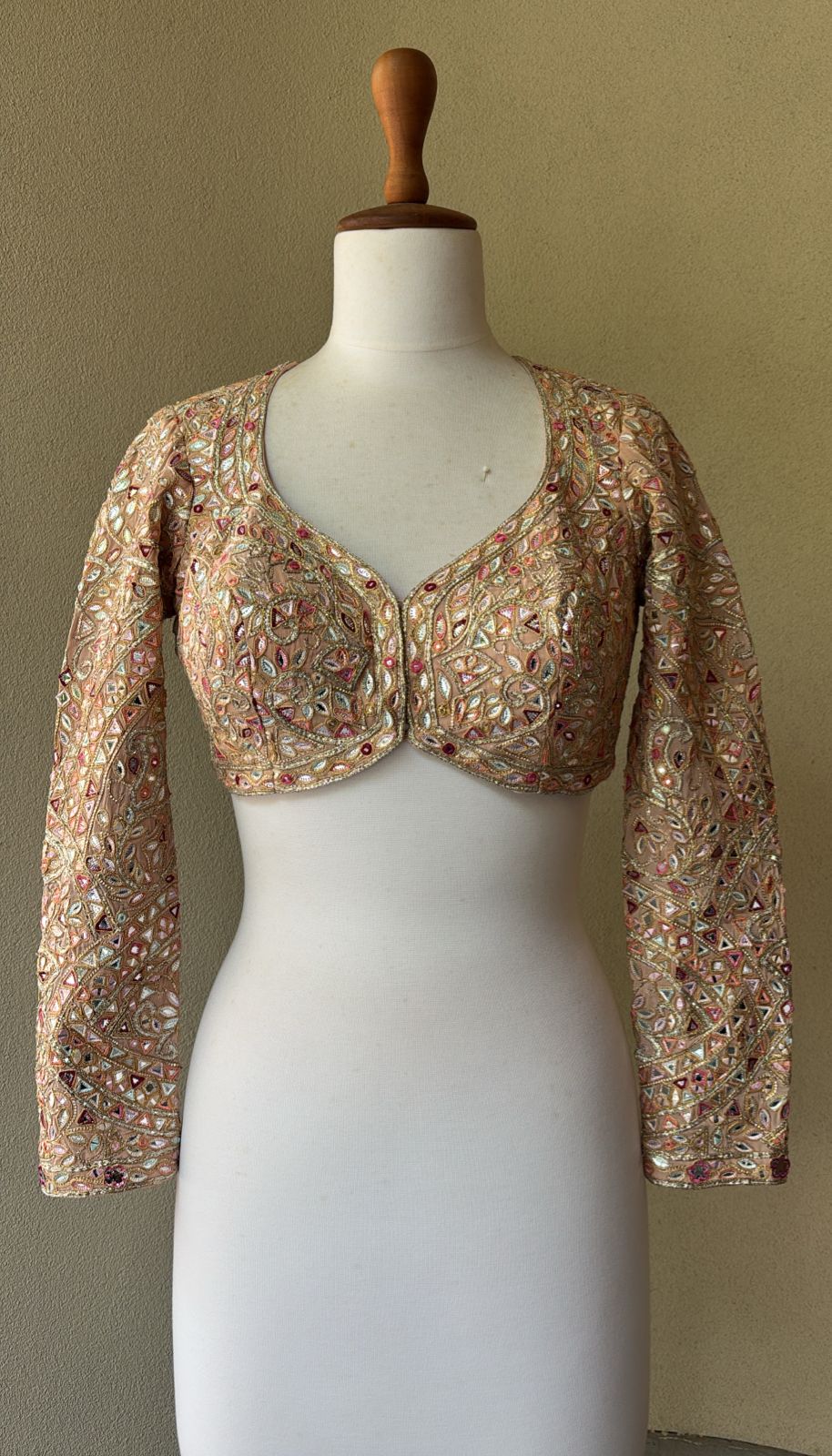Peach georgette blouse with multi foil work