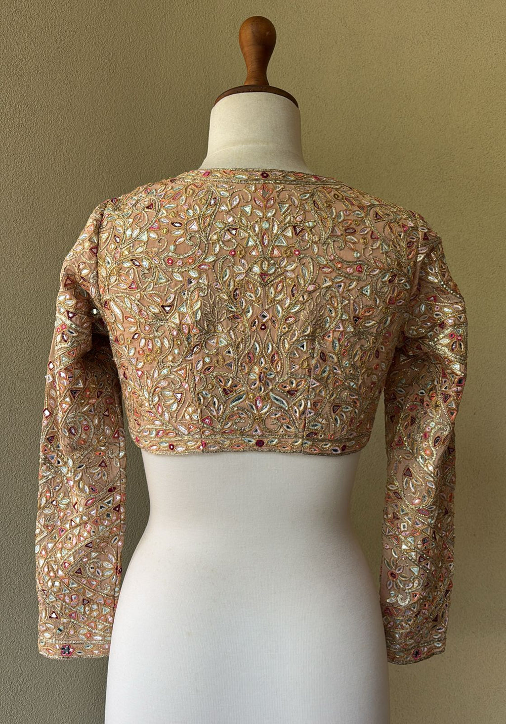 Peach georgette blouse with multi foil work