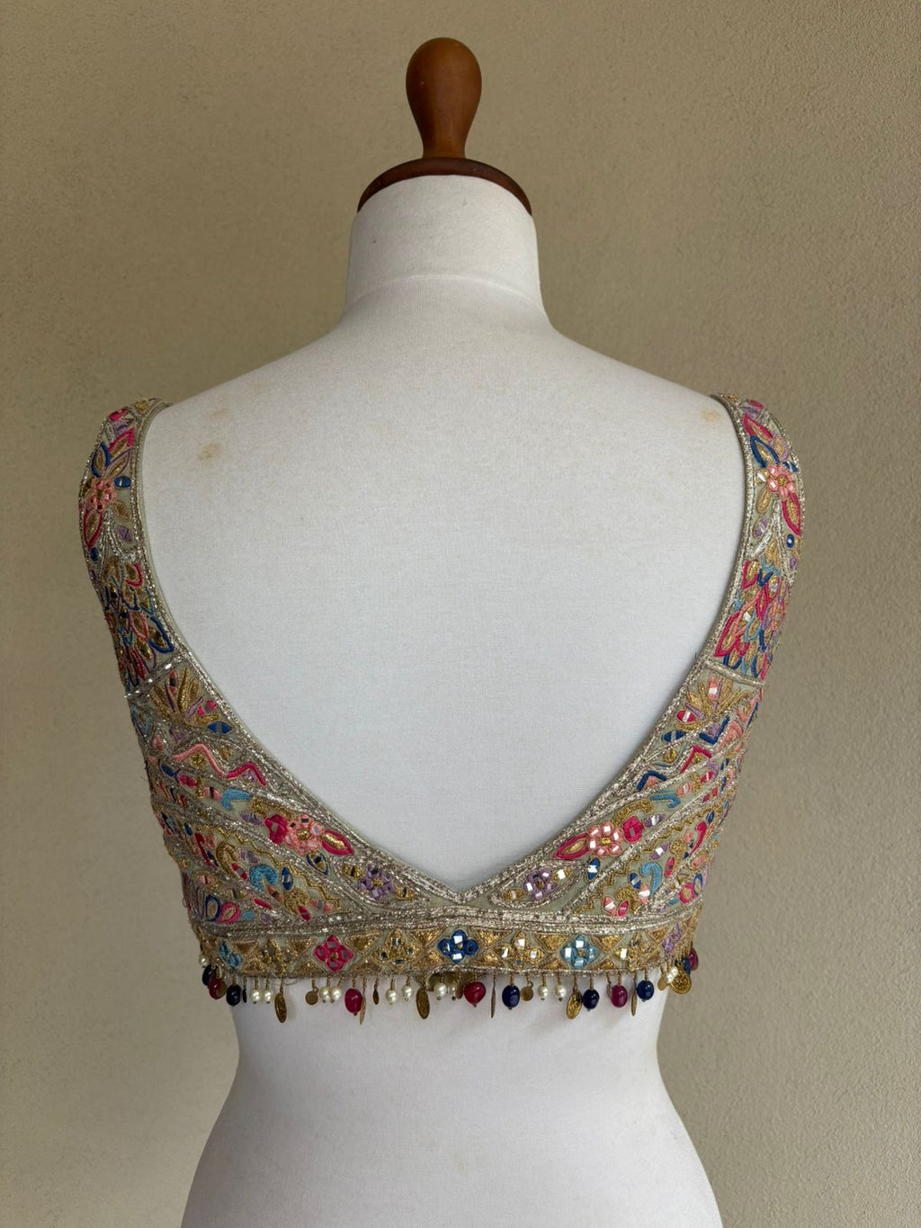 Green silk blouse with resham, gotta, dori and mirror work