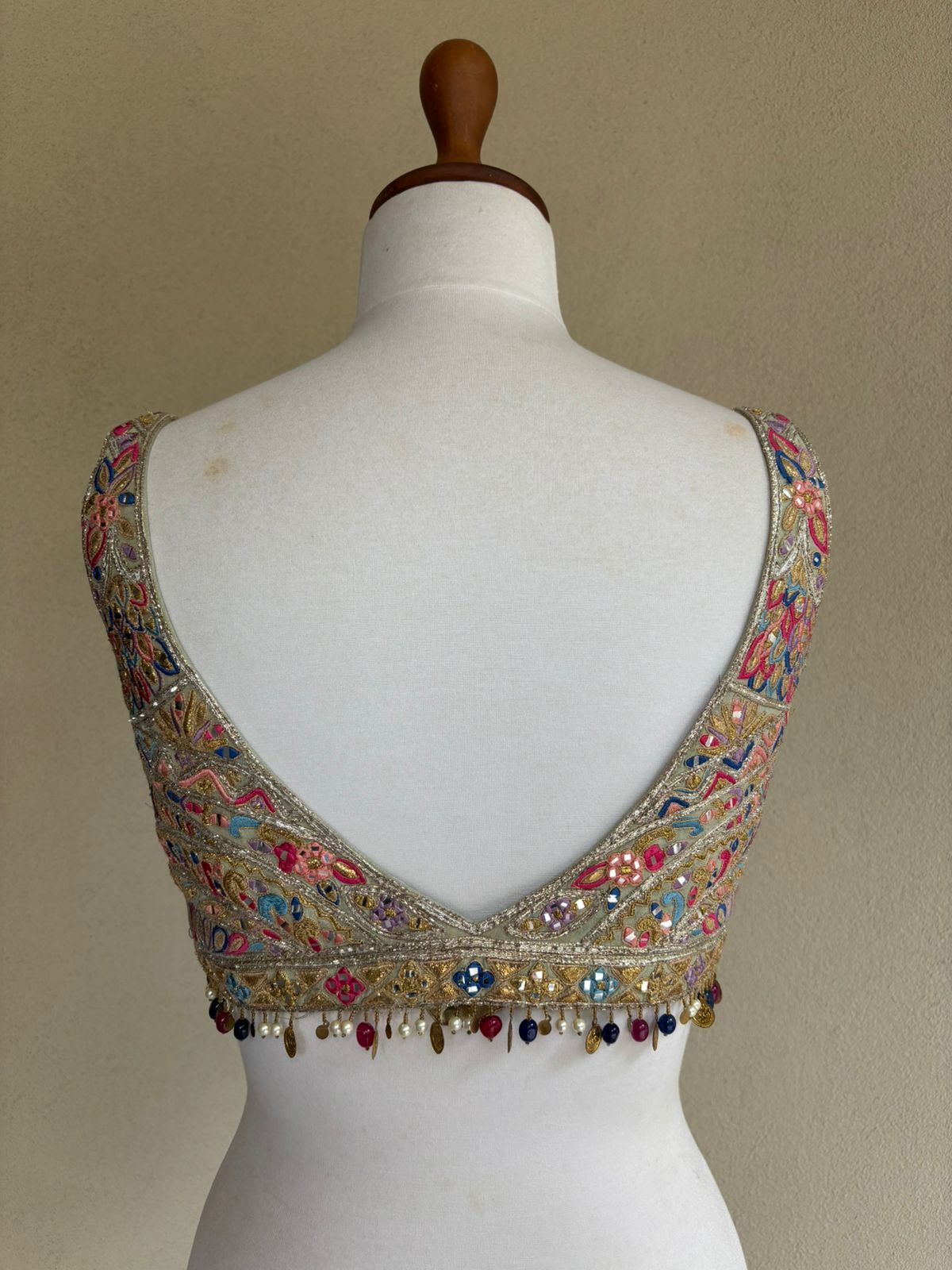Green silk blouse with resham, gotta, dori and mirror work