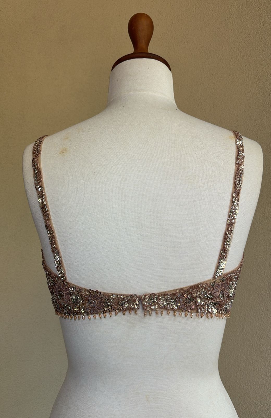 Nude peach blouse with sequins and cut beads