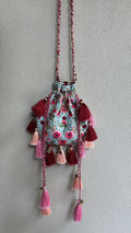 Blue mirror and resham work potli bag with tassels