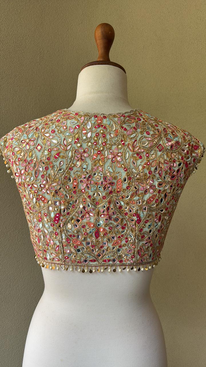 Blue blouse with multi colored resham with foil and gota work