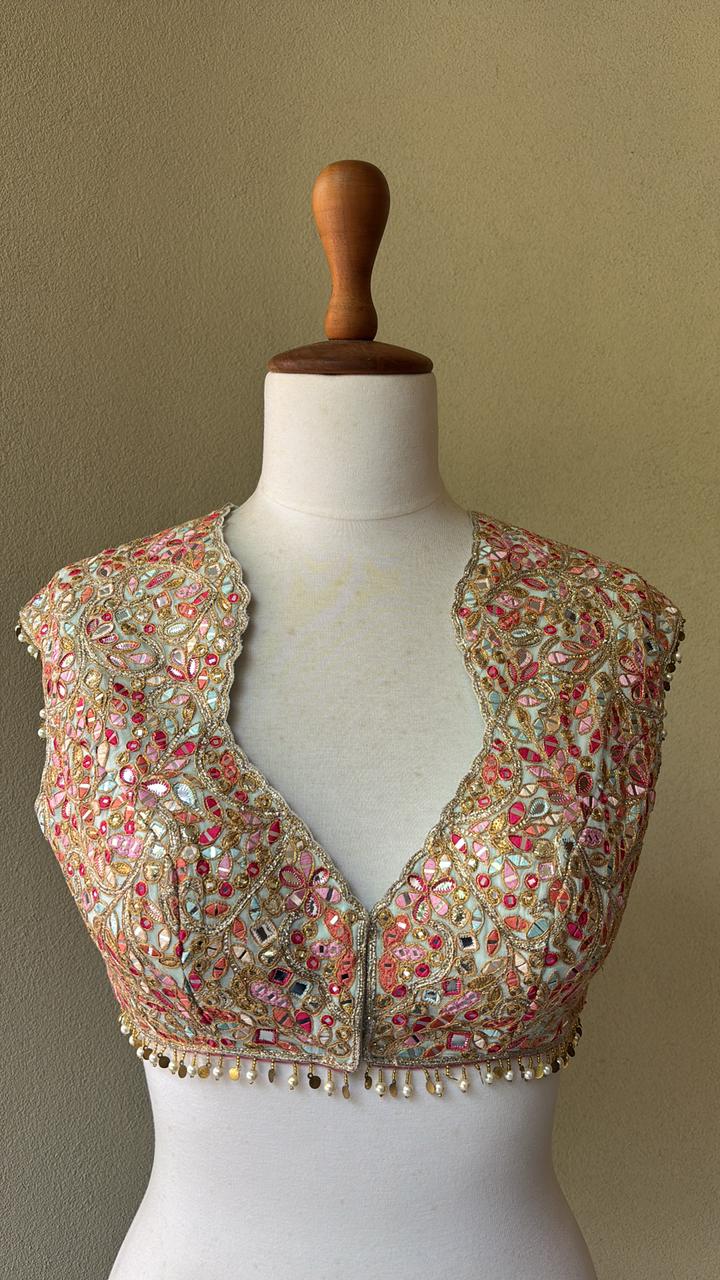 Blue blouse with multi colored resham with foil and gota work