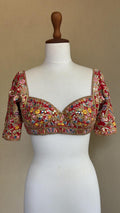 Red blouse with multi colored resham mirror and gota