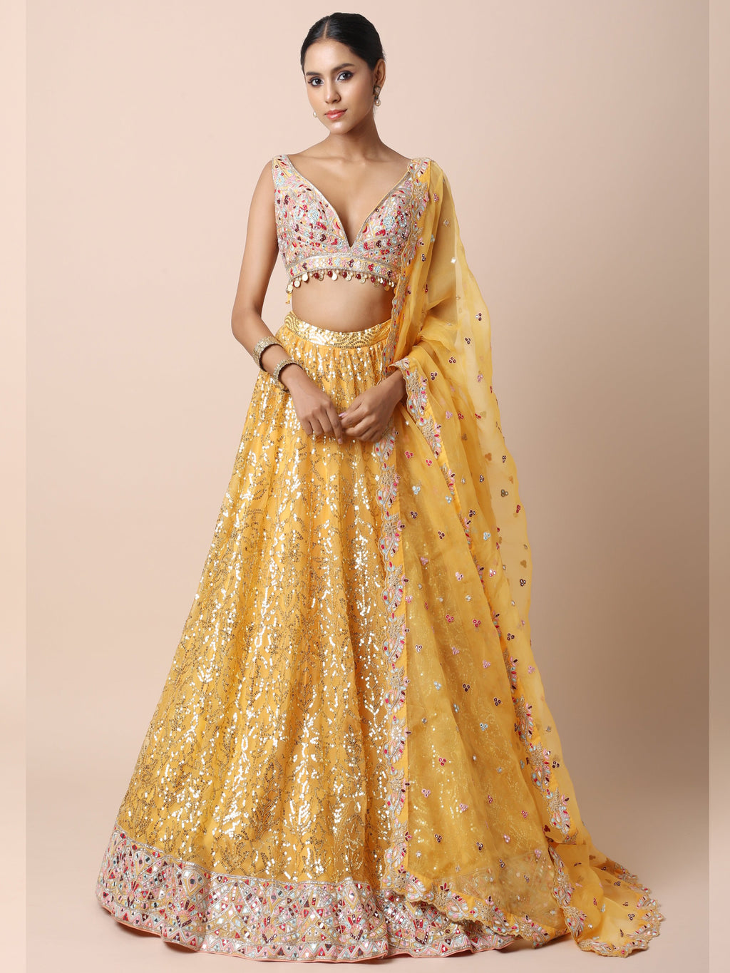Orange Organza lehenga set with multi colored thread mirror and sequins
