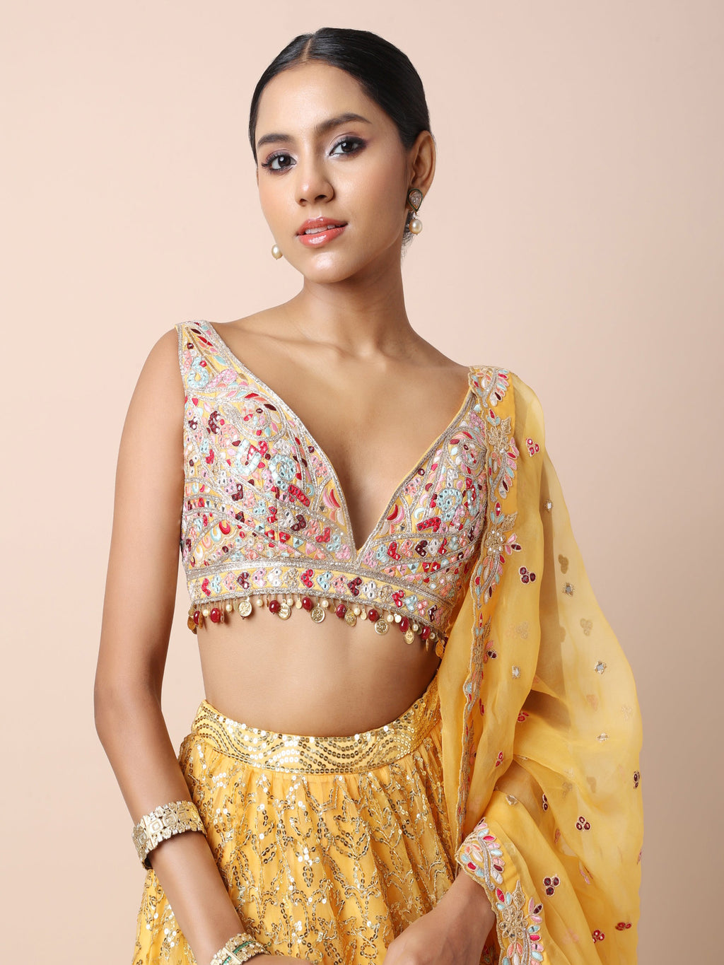 Orange Organza lehenga set with multi colored thread mirror and sequins