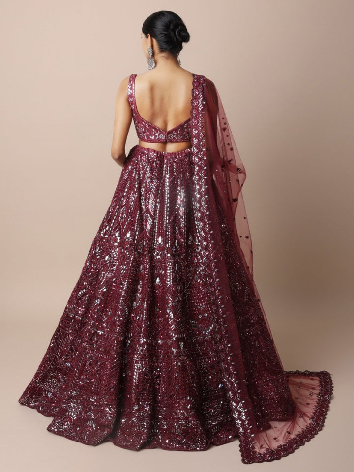 Plum lehenga set with foil, thread and dori work