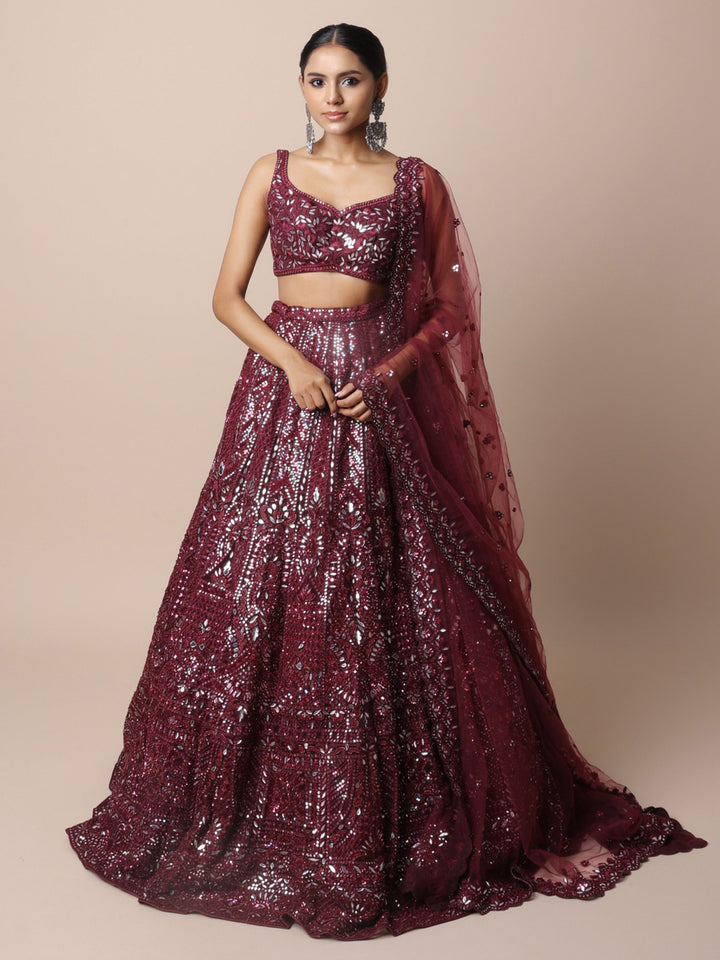 Plum lehenga set with foil, thread and dori work