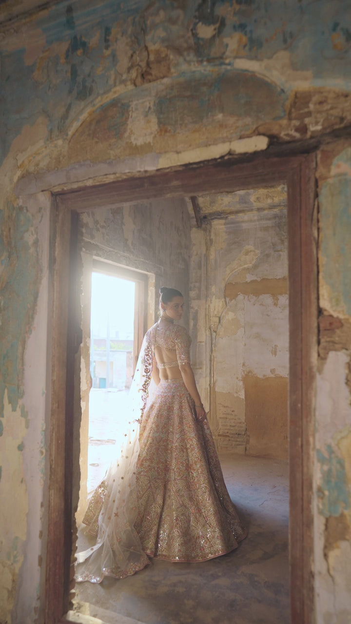 Ivory Heavily Embroidered Net Lehenga Set